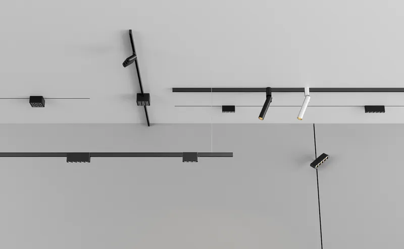 Tizrah track run with spots, linear grilles and a wall disc